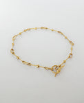 NODES // collier doré- Bijoux ORA-C - bijoux faits main par la designer indépendante Caroline Pham, basée à Montréal.