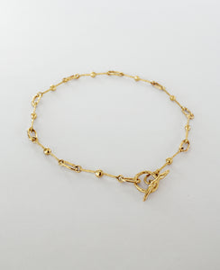 NODES // collier doré- Bijoux ORA-C - bijoux faits main par la designer indépendante Caroline Pham, basée à Montréal.